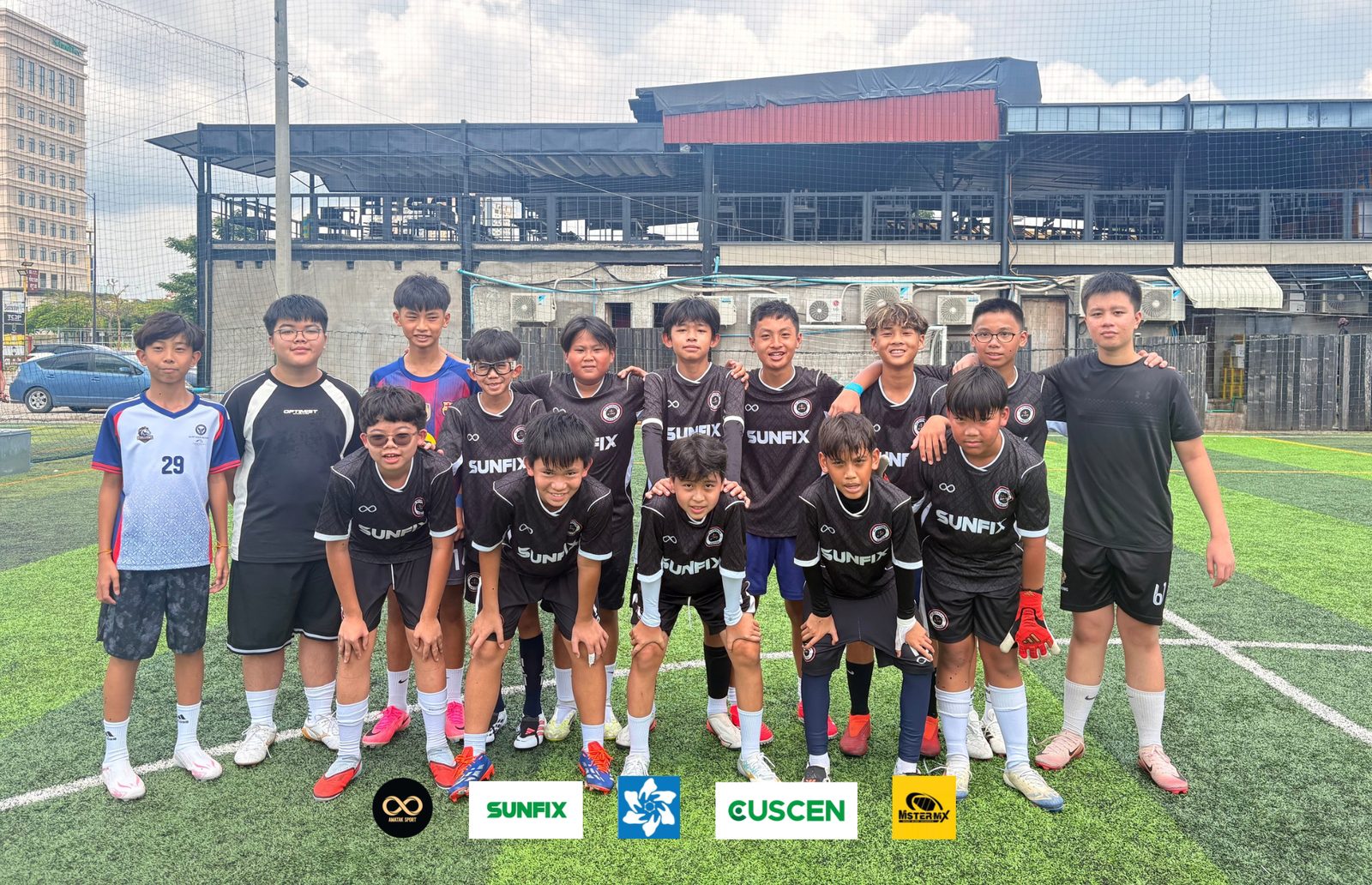 The Gonner United FC U13 team lined up in two rows on an artificial pitch, with partner logos along the bottom of the photo